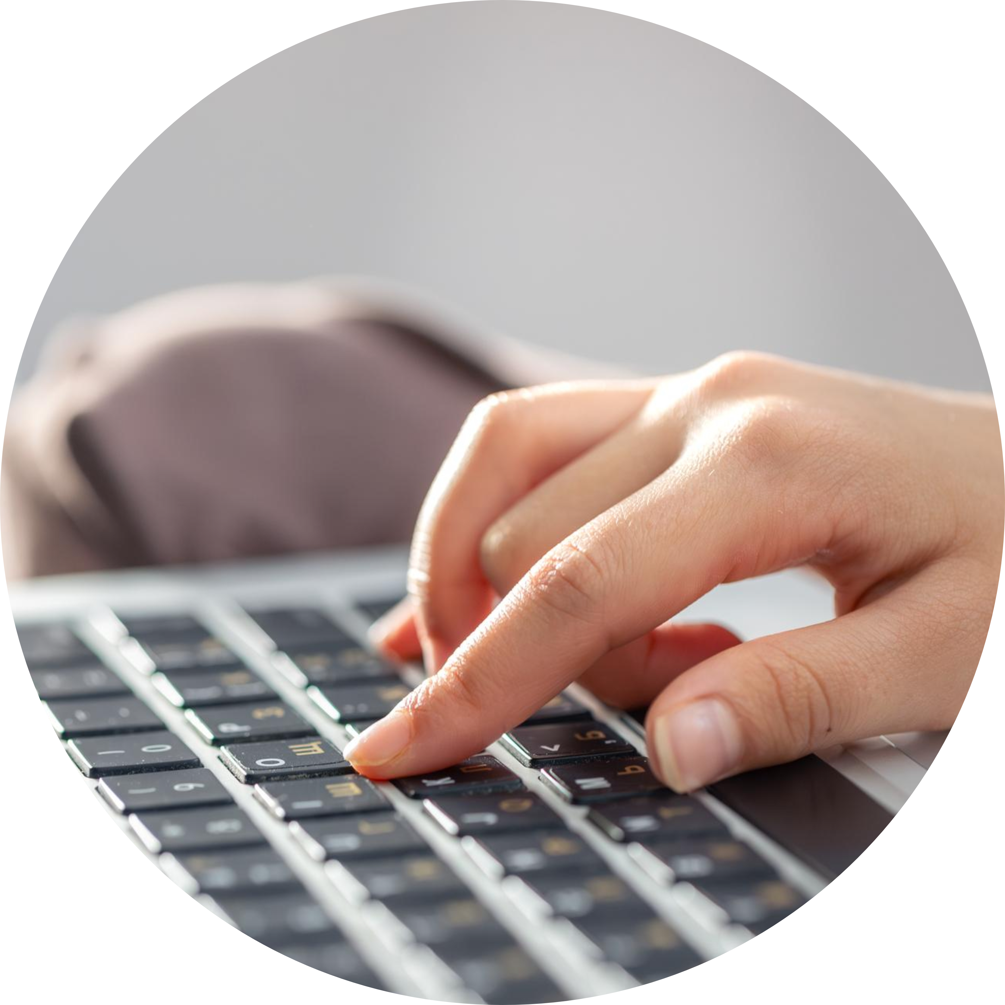 A contributor typing on a keyboard